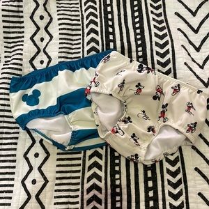 2 pairs of swimming diaper covers